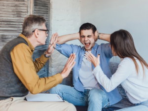 young-angry-couple-after-therapy-session-with-family-psychologist